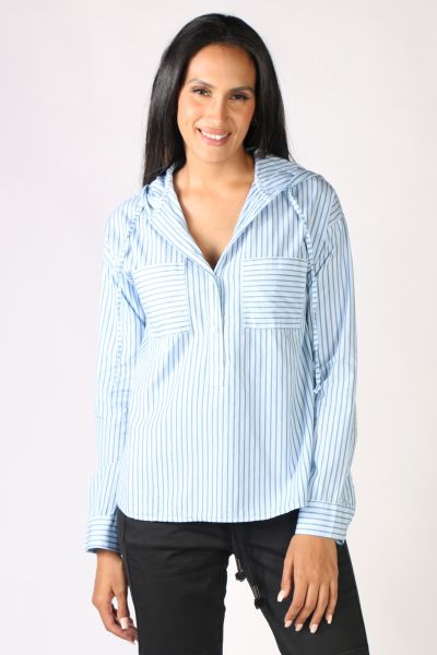 Fashionable Sara blouse is made from pure cotton by Funky Staff. Casual shirt-blouse cut with an attached hood. The blouse is cut as a slip-on style with a button placket and front pockets. The blouse is cut a little longer at the back than at the front i