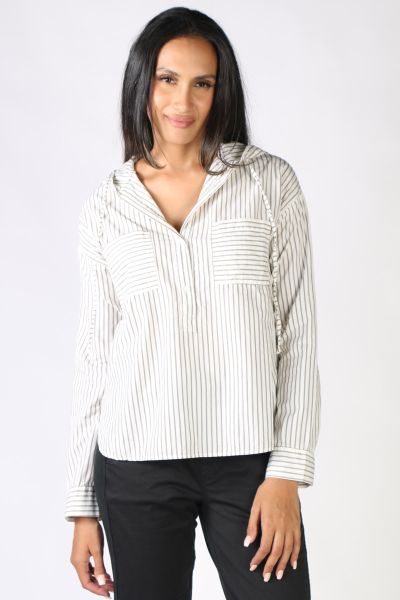 Fashionable Sara blouse is made from pure cotton by Funky Staff. Casual shirt-blouse cut with an attached hood. The blouse is cut as a slip-on style with a button placket and front pockets. The blouse is cut a little longer at the back than at the front i