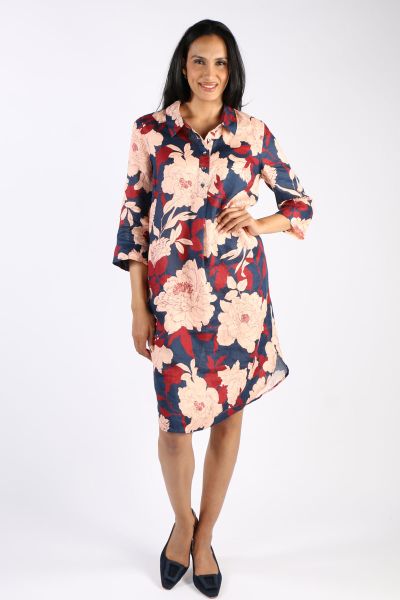 Go for a relaxed and statement dress in this one by Cloth Paper Scissor. Our 100% linen camelia print shirt dress features a 1/2 button placket with a classic shirt collar, 3/4 sleeves, side pockets and a curved hemline. Style it with easy slides or sling