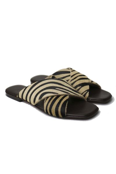 Meet your new go-to sandal, made with soft pony hair for a sophisticated take on the summer sandal. Easy sandal with pony hair upper with lightly padded leather insole. Style 2309.
