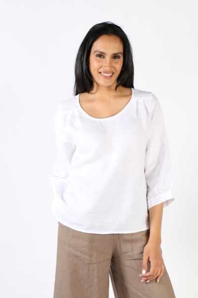 An easy summer top gets an upgrade this season with this top by Blueberry. In a Linen gauze front, the top has linen jersey 3/4 sleeves and buttons at the back of the neck. Pair it with easy denims or shorts for a perfect model off duty look. Style 9789.