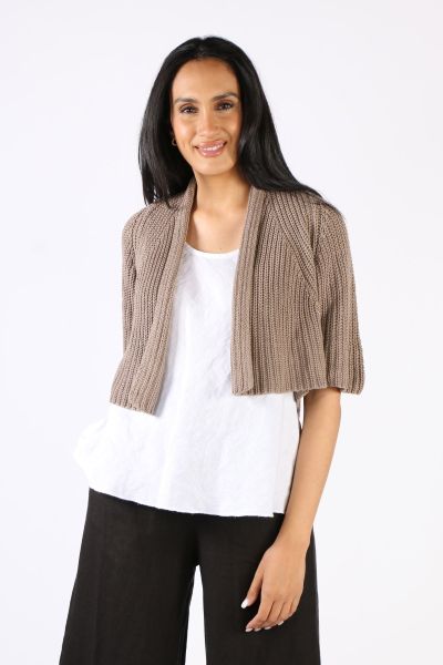 Layer up in style even in summers with this Cardigan by Blueberry. In a Fishermans knit, the edge to edge cropped cardigan has 3/4 sleeves. It can be styled over tees and tanks and paired with easy pants and denim. Style 9033.