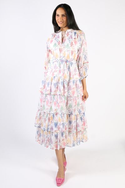 A dress that sashays with your every move, this tiered dress by Boom Shankar moves gracefully with every step. In an overall printed cotton, the dress has an open neck and front tie up. Finished with a tiered design and 3/4 sleeves, style the Maxi Poppy d