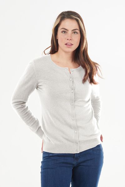 The essential button to neck cardigan by Bridge and Lord is perfect for the season. This classic cardi features a round neck, long sleeves and small buttons along the front. This cashmere merino blend cardigan can be worn layered or on its own, with ribbe