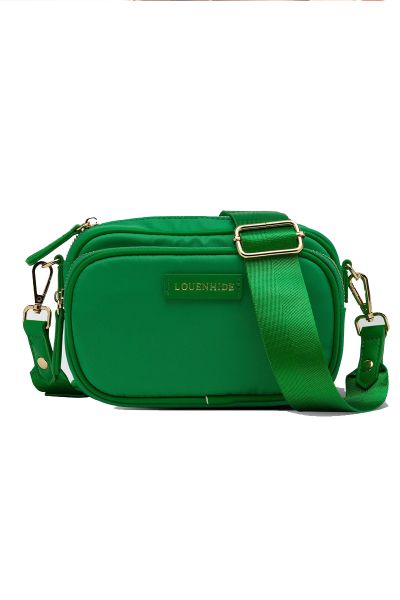 The Louenhide Cali Nylon Crossbody Bag is designed for comfort and convenience. The adjustable and detachable sateen guitar strap allows for comfortable wear crossbody or over the shoulder. The bag features one zip pocket and one slip pocket in the main c