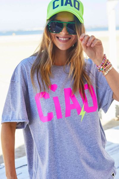 New retro inspired oversized crew neck tee. Vintage washed grey body with neon CIAO print wth a pop of hot pink in the lightening. Raw edges, drop slouchy sleeve and longer length in the body. Style T122.
