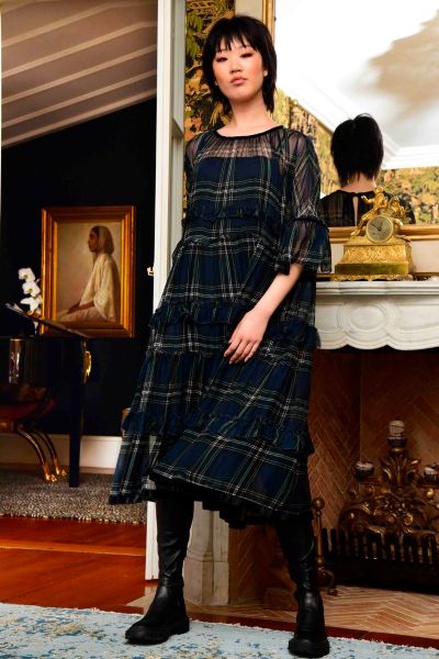The Frillionaire Dress crafted in the Tart TartAn viscose chiffon is the perfect balance of edgy and feminine. This dress features ruffled flounces throughout the dress, flounced sleeves and a delicate keyhole tie back. Pair this with leather boots for a 