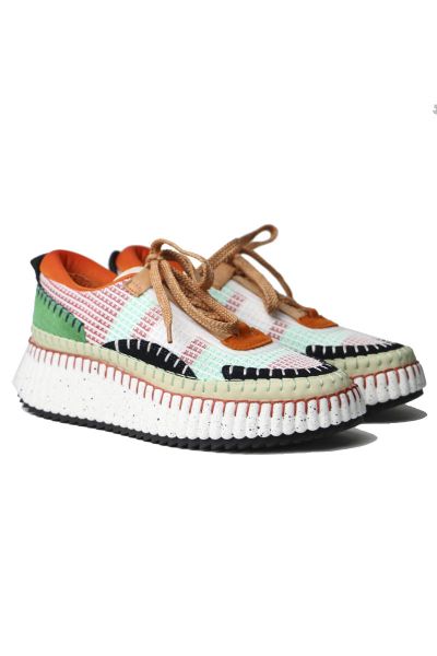 Django and Juliette deliver athleisure high fashion with Copen. These Leather and mesh sneakers feature a removable footbed, and heigh enhancing wedge and platform. The multi colour combo works as a sneaker with a difference. Not your average laceup. Desi