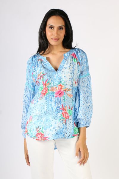 Put on the Lulasoul Dakota Top Sky and experience effortless elegance. Its unique ladder lace on sleeve and curved hem will flatter your figure. Made with lux viscose and an eye-catching digital print, you will look and feel fantastic. Enjoy timeless beau