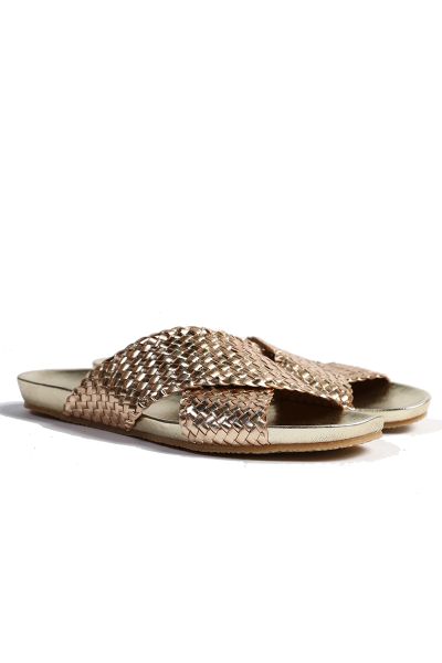 Slides by DP are a statement style made with an incredible woven textured leather. Crafted with a rounded mouled footbed and a minimal heel, this flat will match any outfit in your wardrobe. It will be staple for summertime. Style 54609NEXS2.