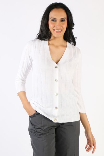 The Rib a Little Cardigan in Ivory by Foil is a light and simple, Spring knit, perfect for having on hand to wear during cooler days. This is a button through style, wear open over dresses, or buttoned up as a sweater. Style 7364.
