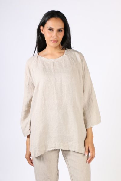 Charlotte top is A Gorgeous new top for us this season its relaxed fitting ,with a round neck, and sleeves for rolling . Perfect light weight cover up falling slightly lower at the back, with a wide panel and rounded hem.