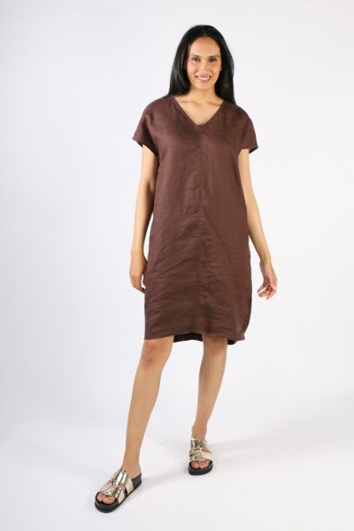 A simple elegant and very wearable shift style dress that is so easy to throw on with sneakers, or dress up if needed . cap sleeve style with V neck sitting just above the knees with side pockets with centre seam detail.