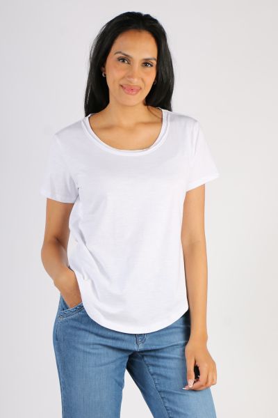 The Cotton Tee featuring a flattering high low curved hem, round neck with raw edge detailing and short sleeves is always a popular cotton t shirt choice to pair with denim jeans or linen pants. Style 3187.
