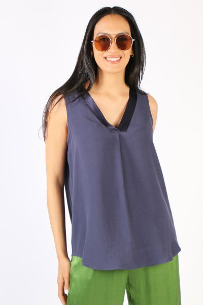 Versatile style at its best with the Tuxedo V neck camisole. In Viscose, with neck pleat front, this sleeveless tank has satin trim overlapping V neck. Perfect on its own or layer under a shirt or blazer. An easy style that works for day to night. Style 4