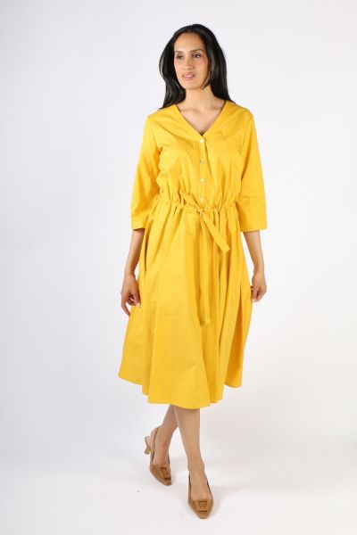 Step out in style with this illium circle dress. In a solid color, this dress with button front, v neck and cinches your waist perfectly. Hugging you in all the right places, it has 3/4 sleeves and side pockets and falls at a perfect tea length. Style thi
