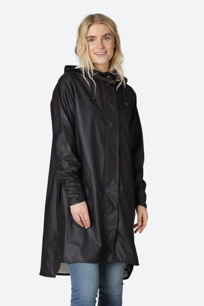 Image of a knee-length, black Ilse Jacobsen raincoat made from waterproof fabric. The coat features a front zip and button closure, a drawstring hood, and two large pockets at the hips. The coat has a flattering A-line shape and is ideal for keeping dry i