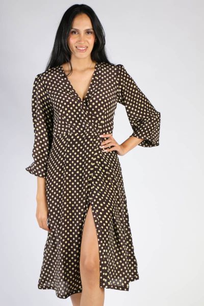 Hugging you in all the right places, the Wrap dress is all sorts of a head turner. With a striking polka dots in a hand blocked pattern, the wrap dress is perfect for those Sunday brunches or cocktail parties - Falling just at your knees, day or night, sl
