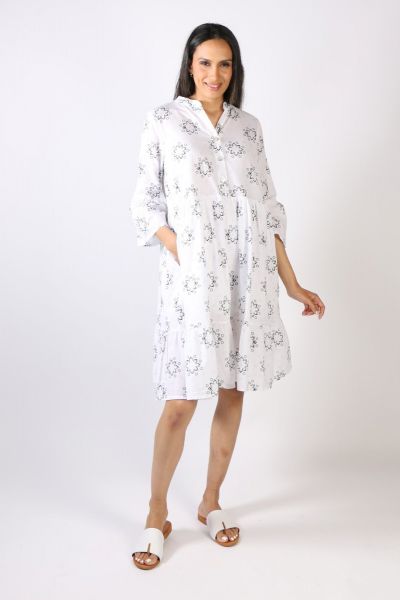 A dress that takes you from day to night by Blueberry is here. The Mandarin Collar dress features an overall mandala print with a front button through and flared sleeves. The cotton dress in a tiered design is perfect for the season and sashays with your 