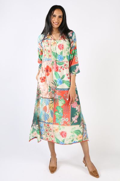 Lulasoul Botanical Maxi Sun, an elegant companion for your sophisticated adventures. Crafted with luxe botanical inspired fabric and an airy maxi silhouette, this dress exudes chic spirit. Flattering features such as 3/4 length sleeves, side pockets, and 