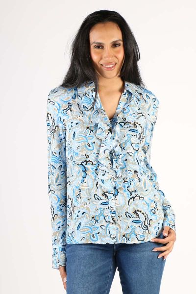 A shirt that sways with your every move. In an overall Paisley print, this shirt is Aster Blue is perfect for the season. With long sleeves and shirt collar, it features a statement ruffle in the front. Style it with easy cotton pants or denim.Style 15128