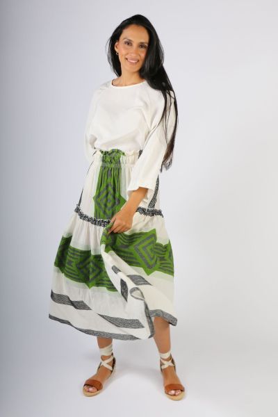 This skirt is a show stopper! Beautiful tiers of rustic pre washed cotton by Pearl & Caviar. The deep smocked waistband leads to ever increasing skirt tiers each with its own rouched detail with the woven fabrication in green. style p68083.