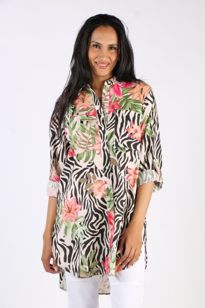 The Tropical Animal Print Shirt by Ping Pong is beautiful blend of two classic and popular prints married into one. This oversized relaxed fit shirt is perfect for this season, an easy to wear throw on that will take you from drab to fab. It is a collared