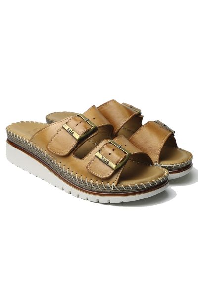 Made in Turkey the Sala Oasis is a really comfortable slide with two leather straps over the foot with buckle to adjust it to the perfect fit. The platform sole offer support and features jute trimming and contrast stitching.