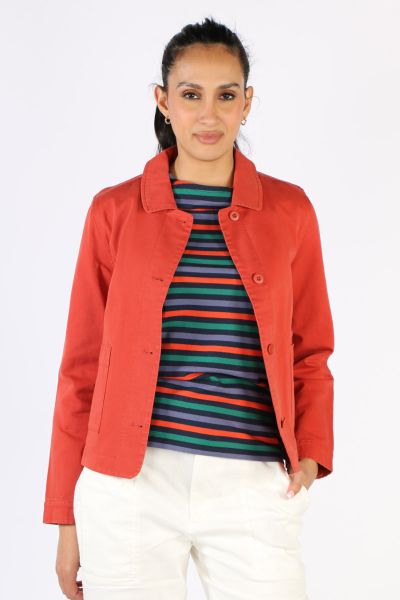 A garment dyed organic cotton jacket with a soft, lived in look. This workwear style is inspired by the studiowear of artists, with simple and easy styling, button cuffs, a rounded collar and square patch pockets, with an extra paint-brush compartment. A 