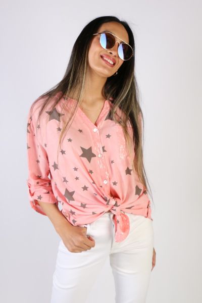 Sway to the spring breeze this season with this Star shirt by Threadz. Featuring an overall star print, the cotton viscose shirt has a button up front and sleeve tabs for styling options. With a tail hem and relaxed shape, style it with skinny denims or t