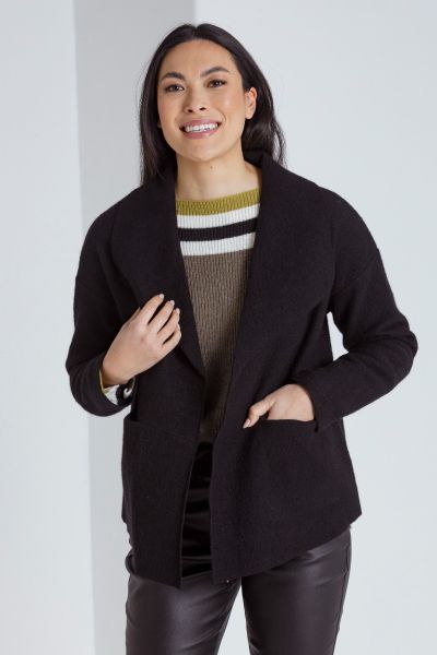 The Long Sleeve Cropped Boiled Wool Jacket is the perfect blend of style and comfort. Made from 100% wool, this jacket is warm and cozy, perfect for chilly weather. The straight hem and collar provide a sleek and modern look, while the drop shoulder desig