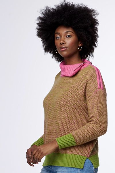 The Zip Collar Jumper by Zaket & Plover is the stylish knit you need this season. This jumper is the ultimate cozy knit, with a roll neck and ribbed hem and cuff detailing. Featuring colour block hem and neck lines, your outfit will never look boring. Wit