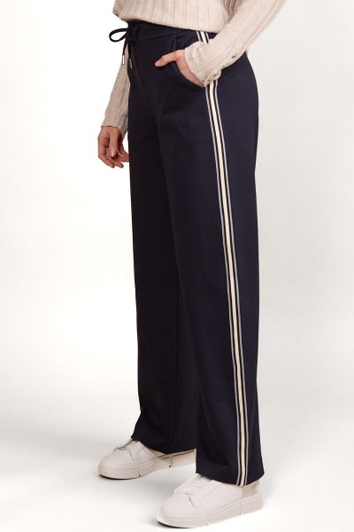 Vassalli Wide Leg Full Length Pant with Side Stripe Panel. Made from stretch twill ponte fabric for the perfect fit. Elastic back waistband with front drawstring featuring metal eyelets and aglets. Two front side angle pockets. Vassalli embroidery below 