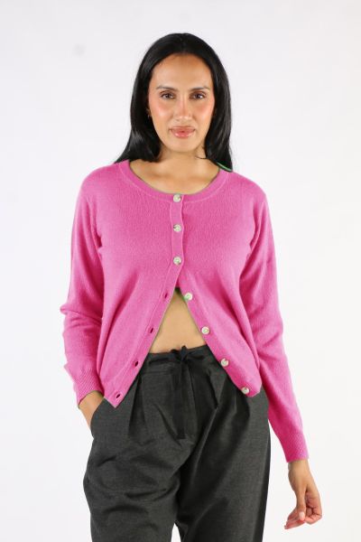 Classic button down Cardigan is a classic by Aldo Martin. In cashmere, the Abune Cardigan has a round neck, full sleeves and front button closure. Style it over dresses or separates alike.