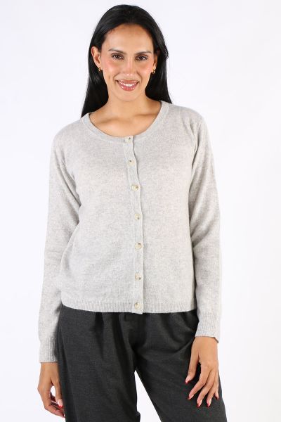 Classic button down Cardigan is a classic by Aldo Martin. In cashmere, the Abune Cardigan has a round neck, full sleeves and front button closure. Style it over dresses or separates alike.
