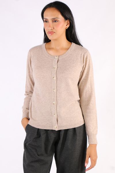 Classic button down Cardigan is a classic by Aldo Martin. In cashmere, the Abune Cardigan has a round neck, full sleeves and front button closure. Style it over dresses or separates alike.
v