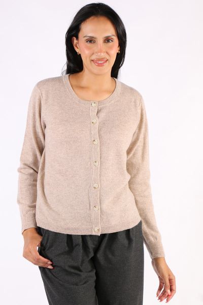 Classic button down Cardigan is a classic by Aldo Martin. In cashmere, the Abune Cardigan has a round neck, full sleeves and front button closure. Style it over dresses or separates alike.
