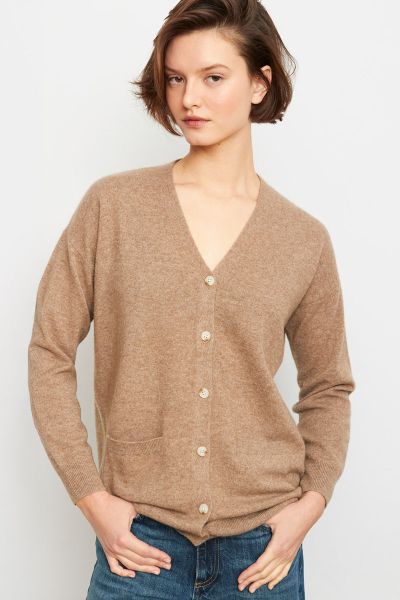 This soft and relaxed classic V neck cardigan is sure to become a winter favourite. So versatile and so soft and warm, it looks just as good with jeans as it does over a skirt or dress for casual winter style. Knitted from high quality cashmere, with butt