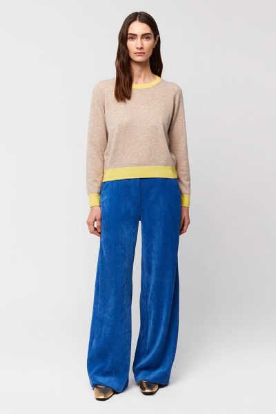 The Aroa Cord Pants is a perfect blend of elegance and comfort. Crafted from soft corduroy, these wide leg pants offer a relaxed yet sophisticated silhouette. Featuring a high rise waist and subtle seam detailing, they provide a flattering drape and effor