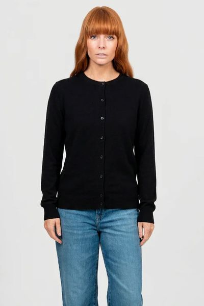 Our Kate Essential Button to Neck Cardi is the perfect all around cardigan. It has a hip grazing length, a Classic button through closure, and a stunning crew neckline. Fitted silhouette, true to size. Wear it over any outfit to add a touch of luxury and 
