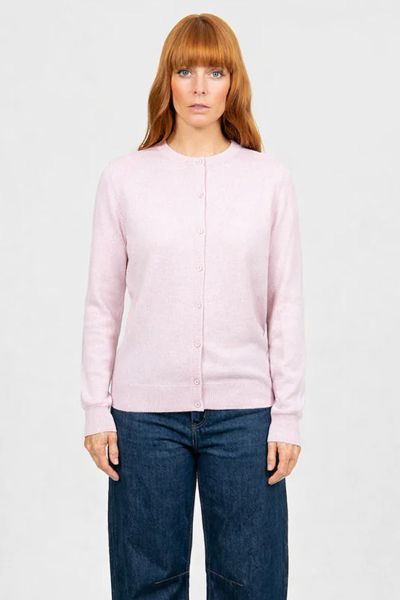 Our Kate Essential Button to Neck Cardi is the perfect all around cardigan. It has a hip grazing length, a Classic button through closure, and a stunning crew neckline. Fitted silhouette, true to size. Wear it over any outfit to add a touch of luxury and 