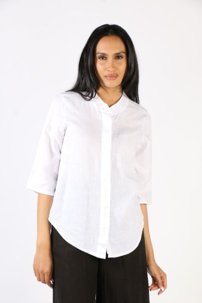 A classic shirt gets a Blueberry treatment this season. In Linen, this shirt has 3/4 sleeves and a front button through along with a Mandarin Collar. Style this shirt with easy pants for a relaxed summer look. Style 9737.
