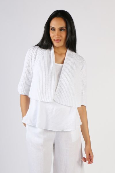 Layer up in style even in summers with this Cardigan by Blueberry. In a Fishermans knit, the edge to edge cropped cardigan has 3/4 sleeves. It can be styled over tees and tanks and paired with easy pants and denim. Style 9033.