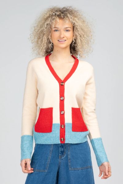 The Boom Shankar Poet Cardigan is a funky, tri-colour twist on your classic cardigan. In a Wool Blend, it features a v-neckline, contrast pockets and a button front opening. With Full sleeves, style this Cardigan with easy cord pants. style W25CR0101.
