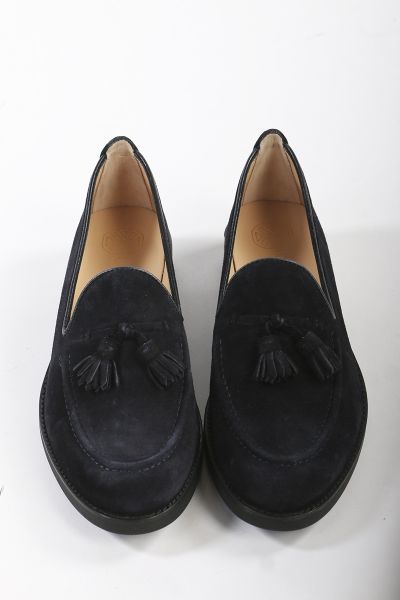 Round toe loafer made in suede. Matching suede tassel trim on the instep. Light, flexible and non slip rubber sole.