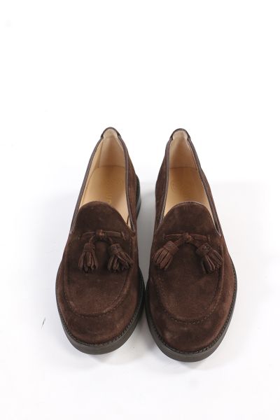 Round toe loafer made in suede. Matching suede tassel trim on the instep. Light, flexible and non slip rubber sole.