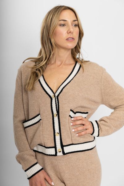 Comfort and class wrapped up in the new Bow & Arrow cropped cardigan. Crafted from our premium wool-cashmere blend in a medium weight, this cardigan is packed with details. a ribbed v neckline, tortoise shell buttons, and chunky ribbing on the pockets and