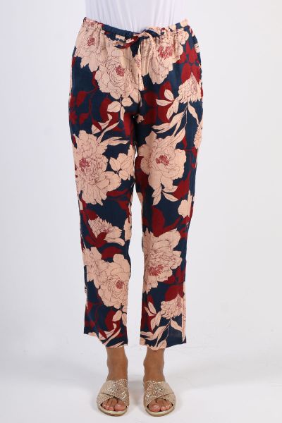 An easy linen pant is the perfect go to for the season. The 100% linen floral pant, is straight cut, with side pockets and an elasticated waistband. It features a linen external drawcord. Style it with solid colour top or matching shirt. Style C151719.

