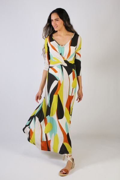 Step out in style this season with a retro vibe this season. The Lauren dress features an overall retro print with long sleeves and wrap dresign that hugs you in all the right places. With maxi length, Style this jersey dress with easy sandals or sneakers
