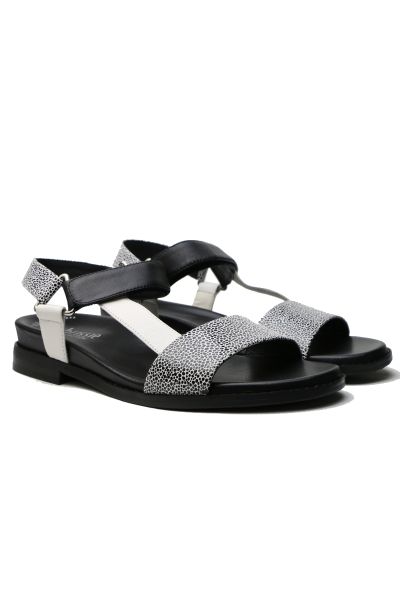 Find the perfect blend of style and support with the Chrissie Fawn Black and White Comfort Sandals for women. These stylish monochrome sandals feature a premium leather upper in a sophisticated speckled fawn print, ideal for a contemporary summer look. Ex